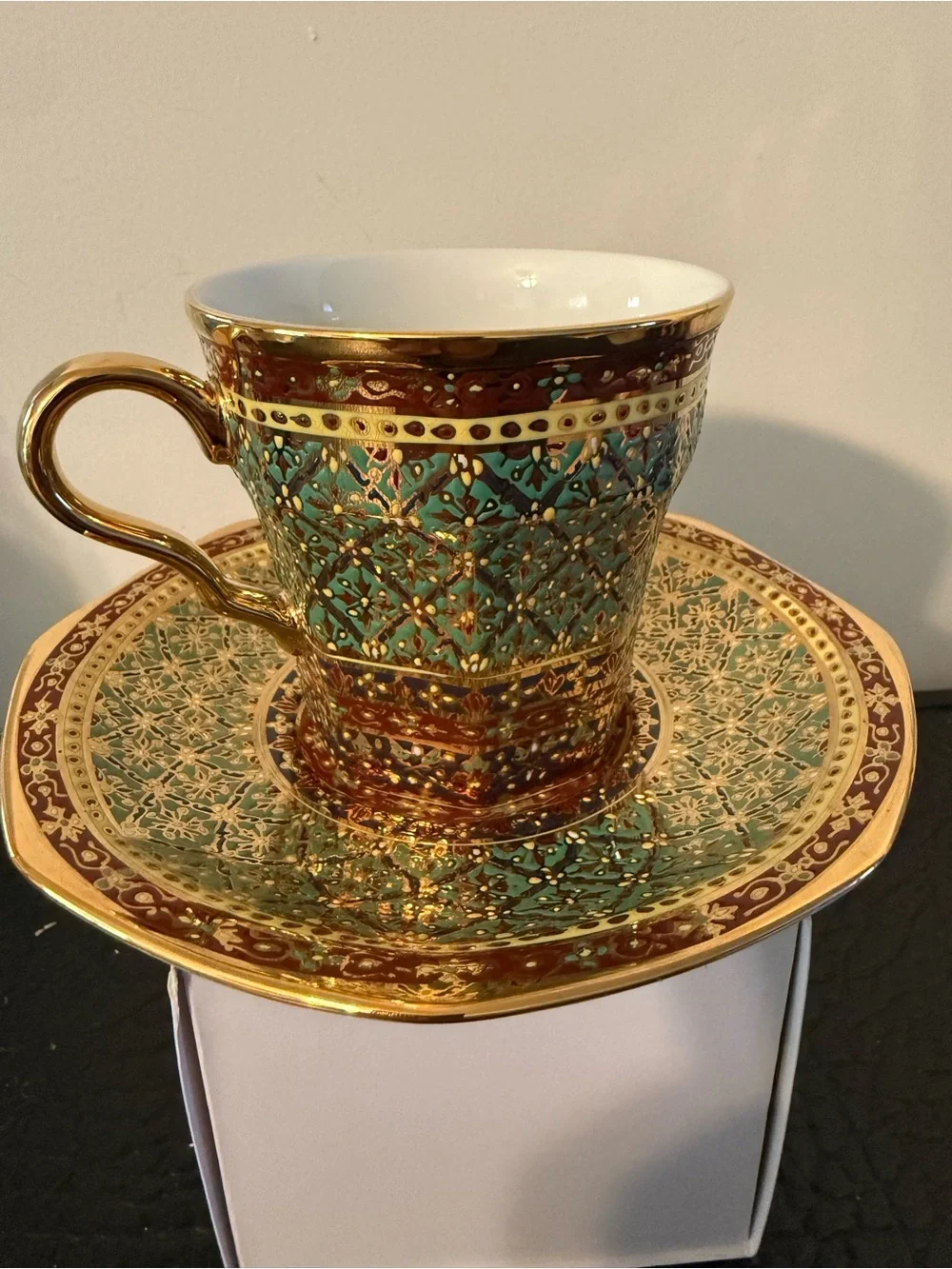 PIPATANA BENJARONG Green red and Gold Porcelain Teacup with Saucer.